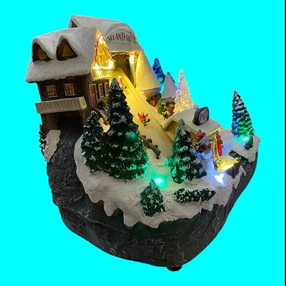 Gerson Alpine Village Christmas Castle Musical Revolving Tree Skiers Lighted - Picture 6 of 11